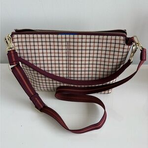Rothy's The Daily Crossbody in the Malbec Grid pattern.